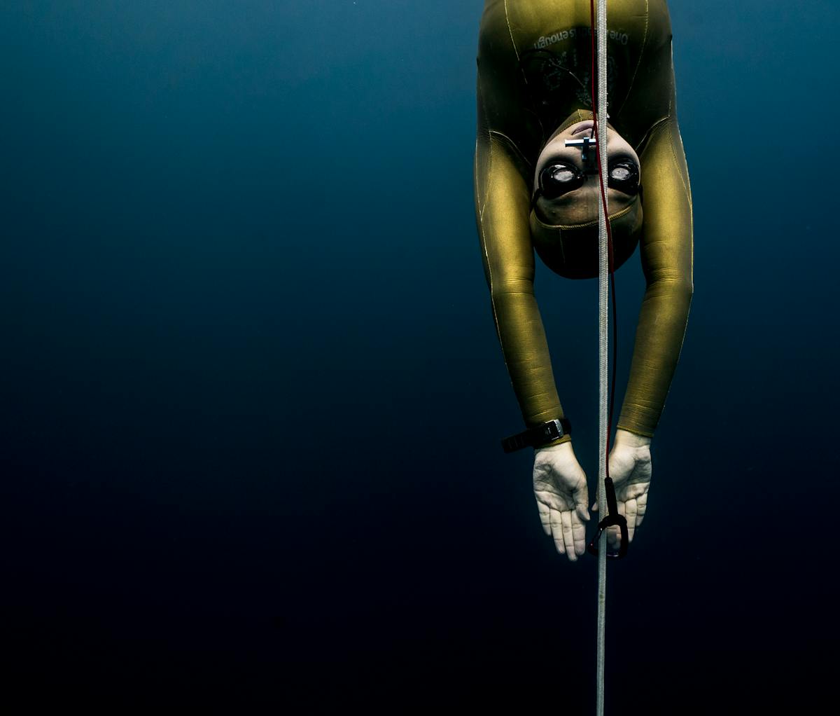 A freediver gliding underwater